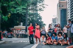 A bustling urban scene with diverse crowd on a Sao Paulo street.