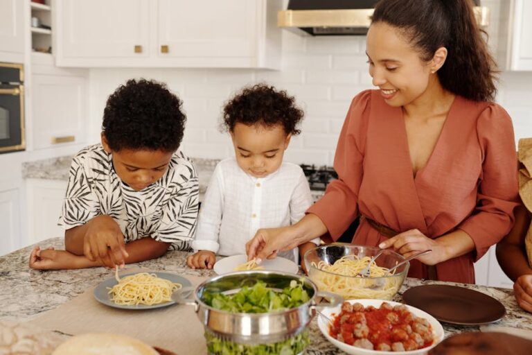 Mother and children preparing pasta together in a cozy kitchen setting.